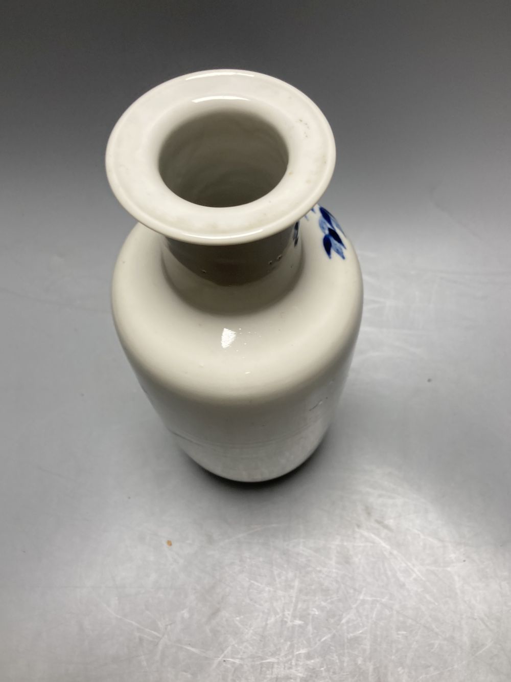 A late 19th century Chinese blue and white rouleau vase, height 25cm